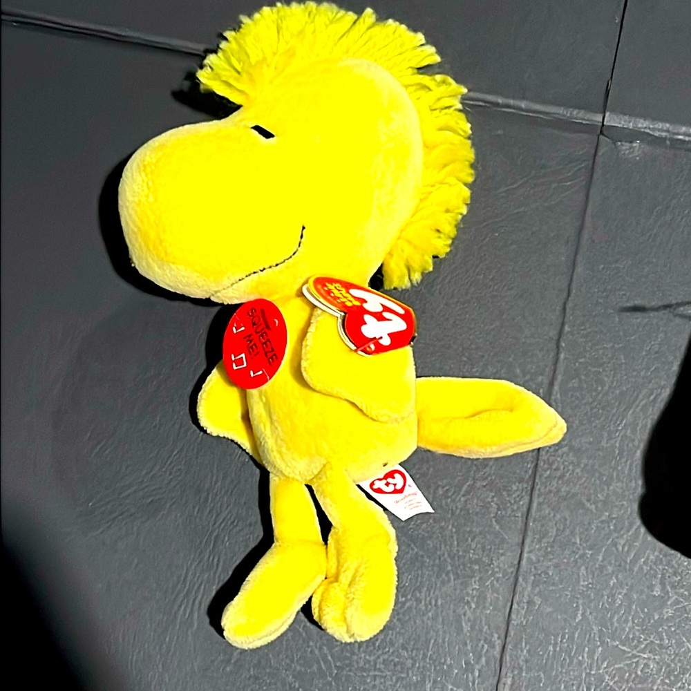 1 Woodstock beanie baby doll. With tags. And barcode. Yay